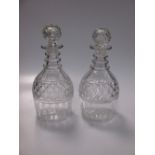 A pair of Regency cut glass ring neck decanters (2)