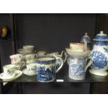 A collection of blue and white ceramics to include two coffee pots, one tea pot and other various