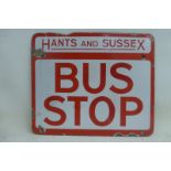 A Hants and Sussex Bus Stop double sided red and white enamel sign with some professional