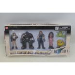 A boxed Final Fantasy VII Collectable Edition set of figures, made in China.