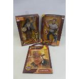 Two Indiana Jones figures and a carry pack.