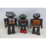 A Japanese part tinplate Mr Galaxy robot and two fighter robots.