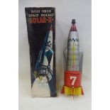 A boxed Japanese tinplate battery powered space rocket Solar-X by Nomura.