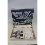 A boxed electronic shoot-out in space space station target game by Tomy.