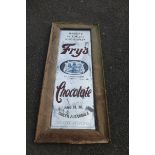 A Fry's Chocolate narrow advertising mirror in wooden frame, 14 1/2 x 9 1/2".