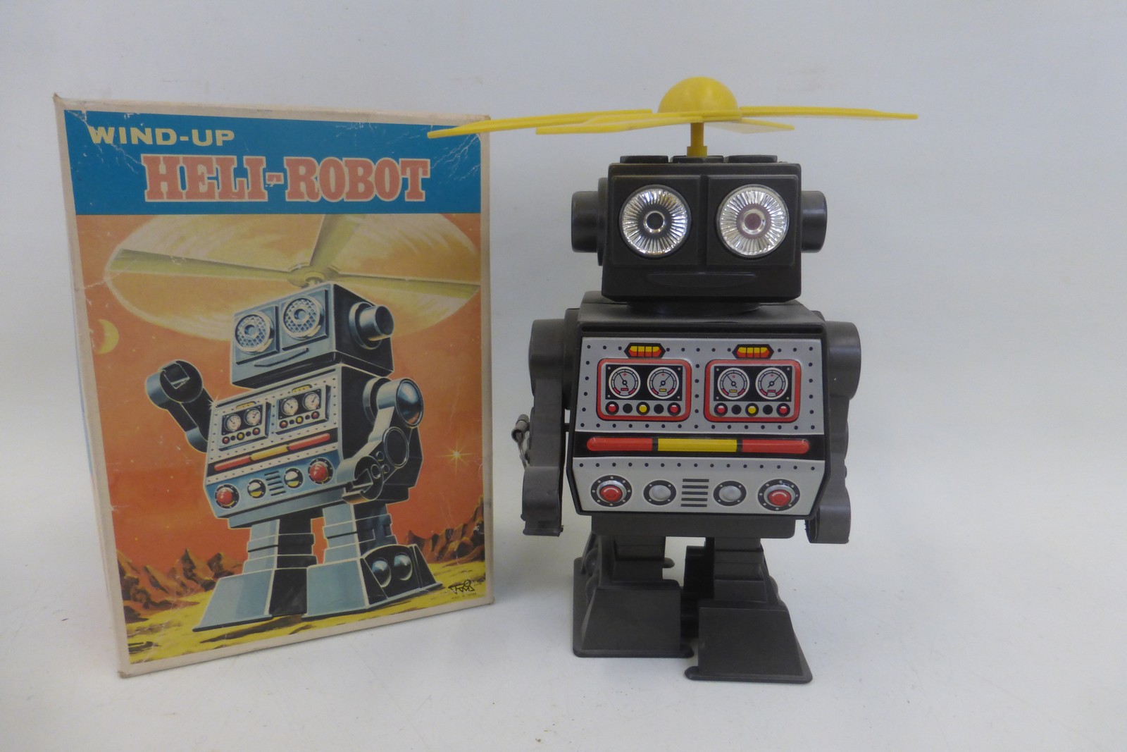 A boxed wind-up Heli-Robot, made in Japan.