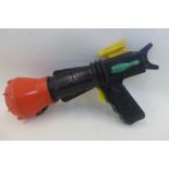 A Merit plastic toy space pilot three colour Inter-Planet Supersonic Gun as seen in Dan Dare.