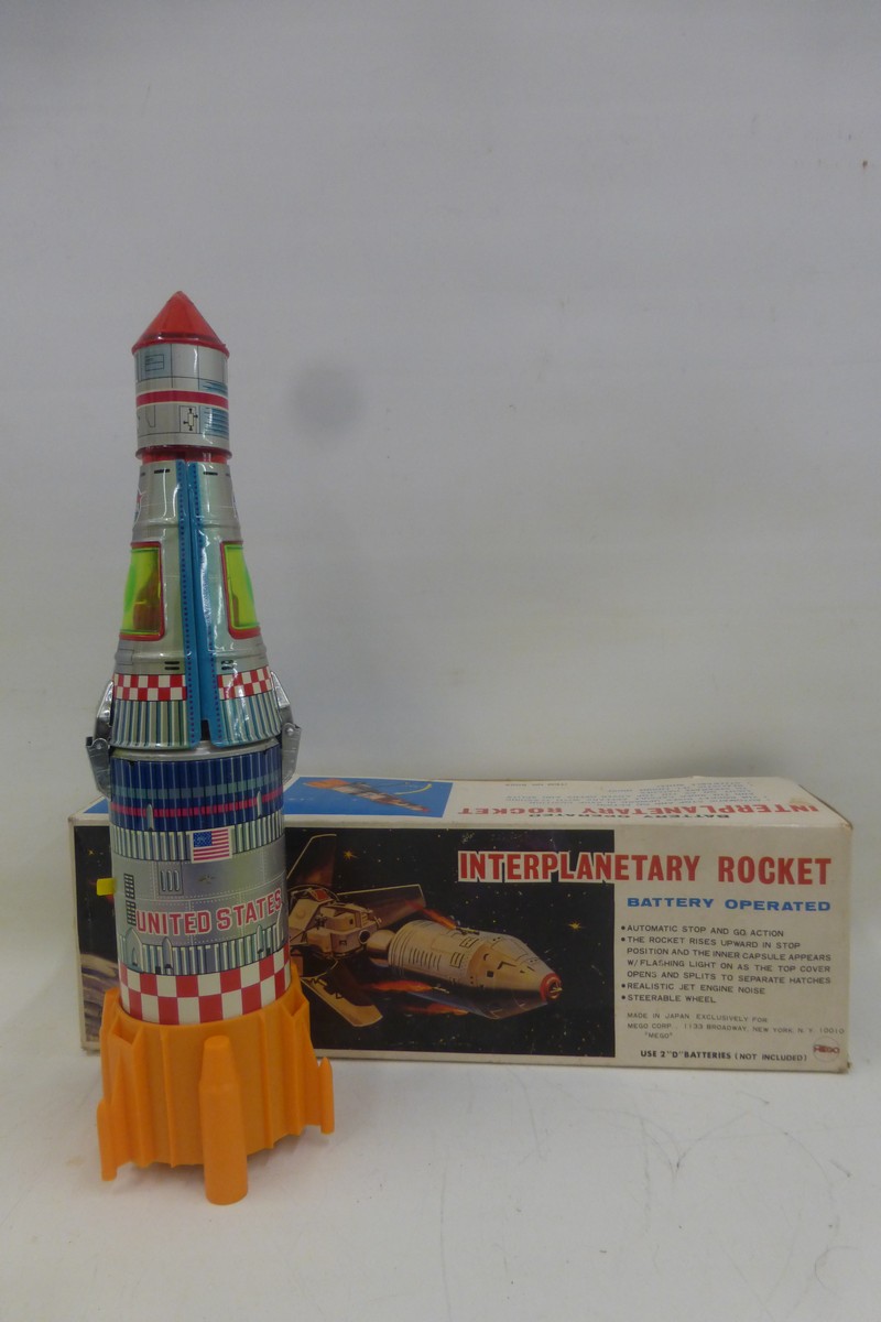 A boxed battery operated Inter-planetary Rocket, made in Japan exclusively for Mego Corp by