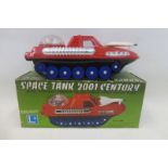 A boxed plastic space tank 2001 Century, made in Taiwan.