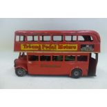 A Tri-ang friction drive tinplate London bus.