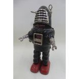 A Japanese clockwork tinplate Robbie the Robot Planet Robot.