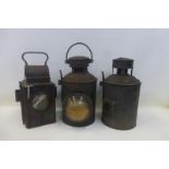 Three railway lamps, one marked BR(M)M.