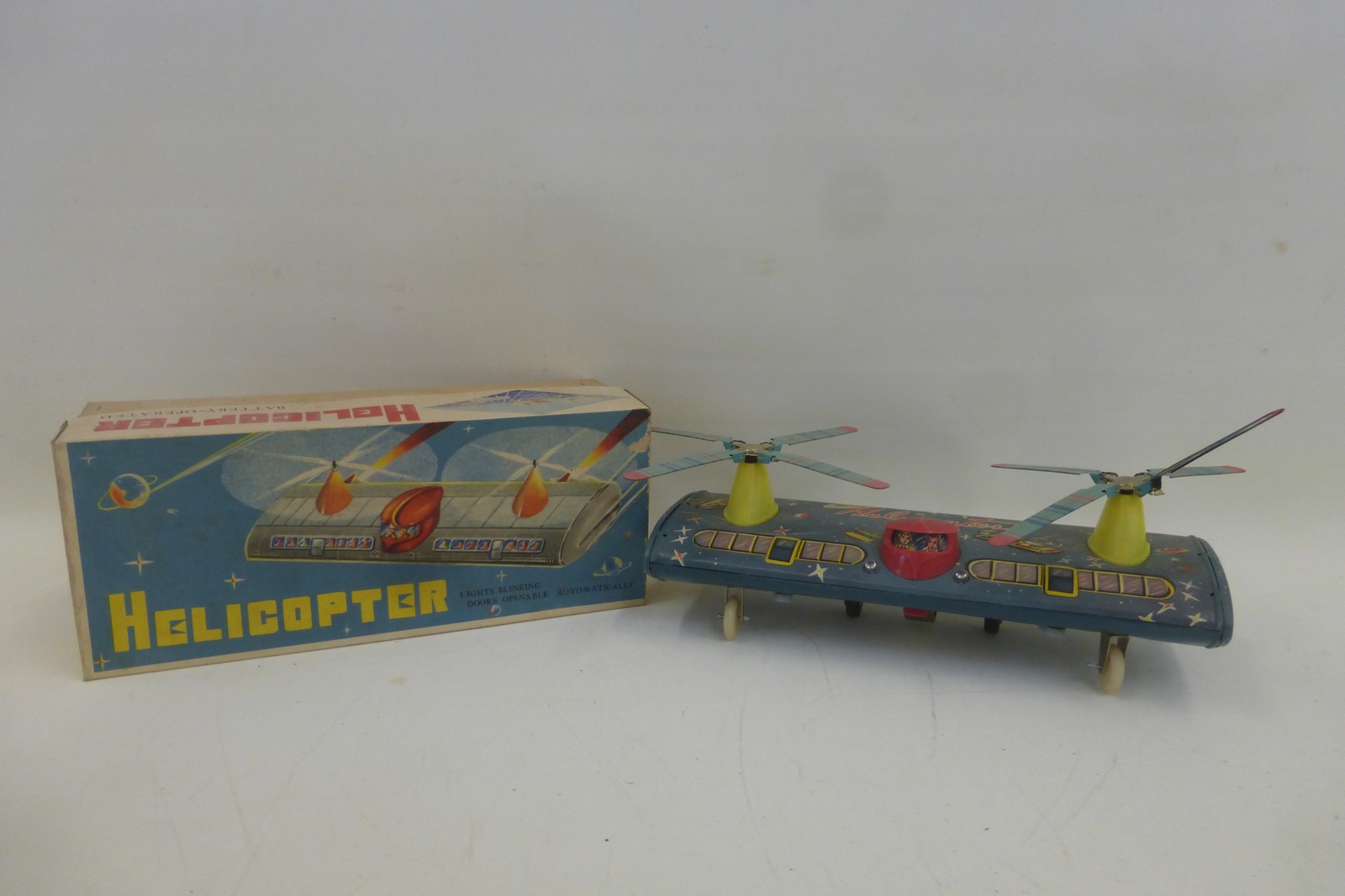 A boxed Chinese tinplate helicopter, battery operated.