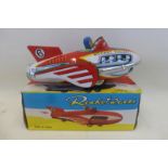 A boxed Chinese tinplate Rocket Racer.