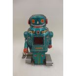 A Japanese tinplate clockwork Sparky Robot by Noguchi.