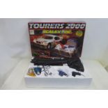 A boxed Scalextric Tourers 2000 set.