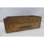 A Cantrell & Cochrane wooden crate.
