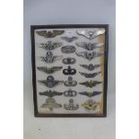 A framed display of 22 US Air Force Pilots badges; all appear to retain their fixings to the