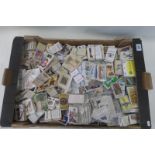 A large box of cigarette cards, including Turf, Ogden's British Birds, Carreras Ltd 'Happy