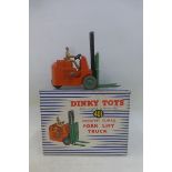 DINKY TOYS - Fork Lift Truck, no. 401, fair in a fair striped box.