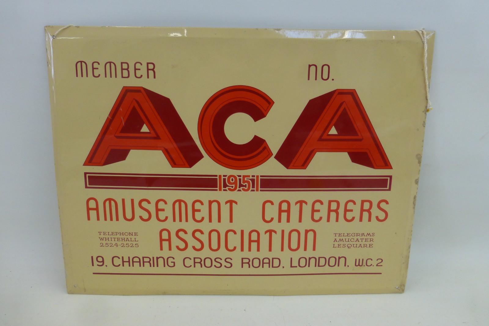 An ACA (Amusement Caterers Association) tin advertising sign, 12 x 9".