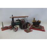 A Mamod stationary steam engine and a Mamod steam tractor.