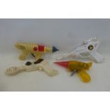 A friction powered space razor ray gun and three others.