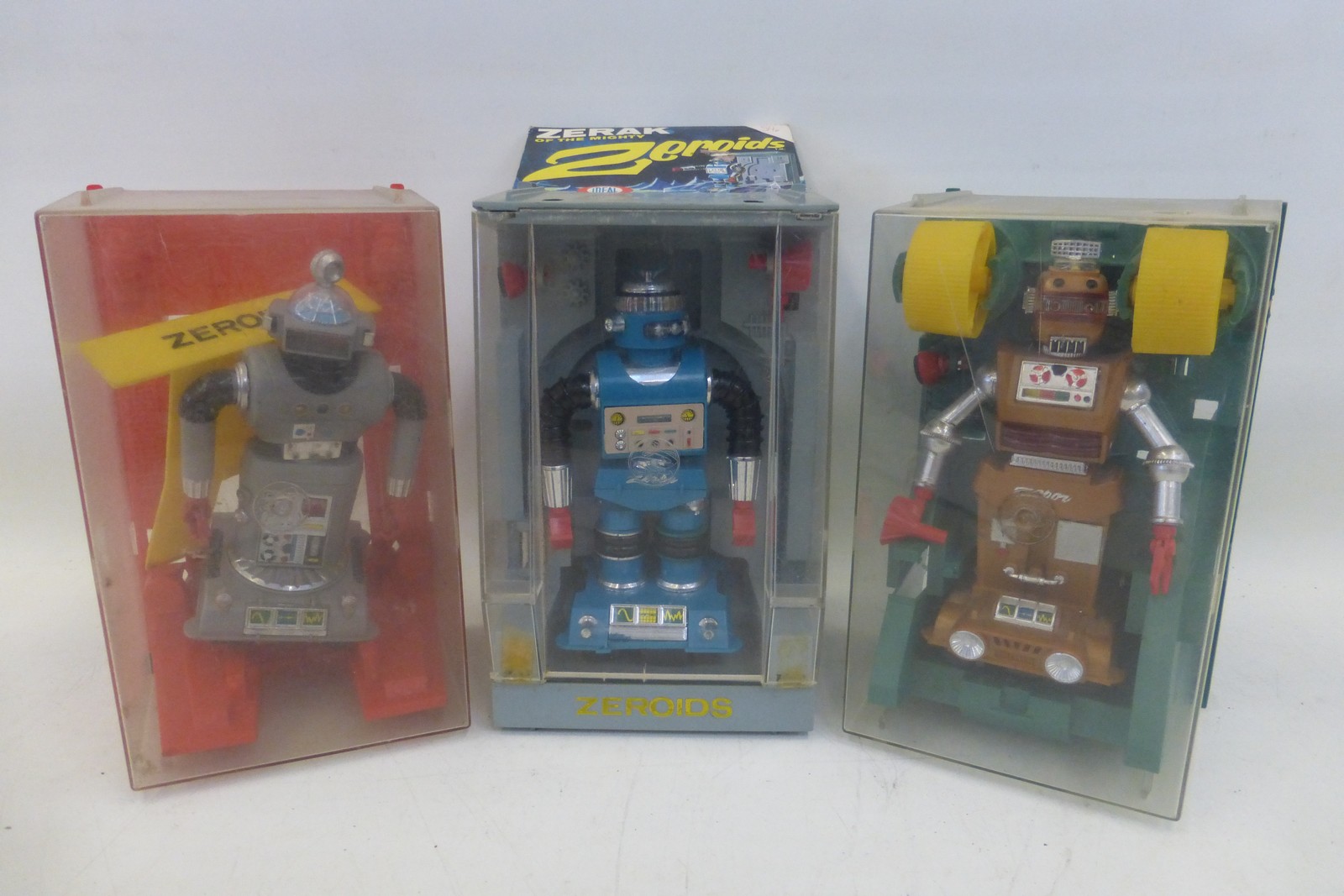 An Ideal Toy Company Zerak of The Mighty Zeroids robot in original packaging, and two others.