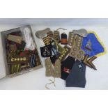 A large quantity of military epaulettes, shoulder boards and cord lanyards.