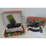 A boxed Micro Scalextric World Championship set and a Scalextric Grand Prix set.