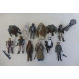 A selection of early Star Wars figures.