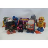 A selection of assorted robots to include two monster robots, various makers.