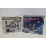 A boxed radio controlled Staraker, with sound effect ray gun.