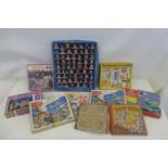 A collection of space related jigsaw puzzles etc.