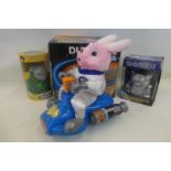 A boxed Duracel Ultra Space Scooter Bunny also a boxed Gigabot and an interactive RoboNagi.