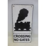 A reproduction cast iron 'Crossing No Gates' sign, 11 1/2 x 23".