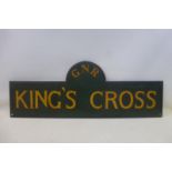 A reproduction G.N.R. King's Cross painted wooden sign, 38 x 14".