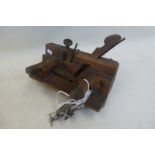 A C.Nurse & Co. Ltd of London wooden plane and an unusual screw thread tool stamped Labomeca.