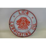 A decorative oil on board advertising Lion Lubricating Oil, 20 1/4" diameter.
