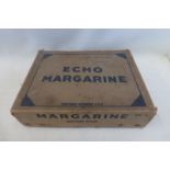 An Echo Margarine cardboard box.