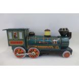 A Japanese tinplate 'Western' locomotive made by Masudaya