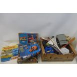 A box of mixed toys and games etc.