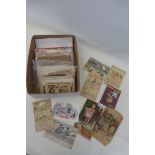 A small box of mixed postcards, including one with a 'rocking boat' feature, also Raphael Tuck &