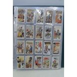 An album of cigarette cards including Churchman 'Boxing Personalities' and 'Association