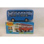 A boxed tinplate double decker bus, made in China.