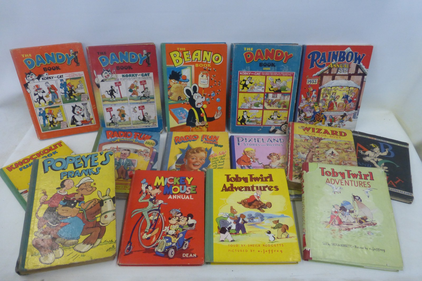 A good collection of early childrens' annuals including 1950s Beano, 1950s Dandy, Mickey Mouse, Toby