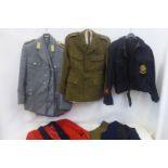 A quantity of military uniforms including Light Infantry and Luftwaffe.