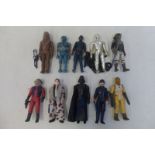 A selection of early Star Wars figures.