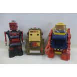 A large King plastic robot by Topper, a 1978 Megocorp tape playing robot - 2XL made in Taiwan and an