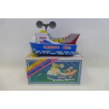 A boxed Chinese tinplate Universe boat.